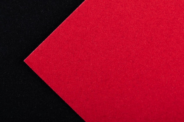 Bright red and black color paper texture background. Velvet cardboard