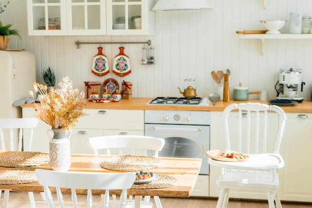 Bright spacious dining room with wooden big table