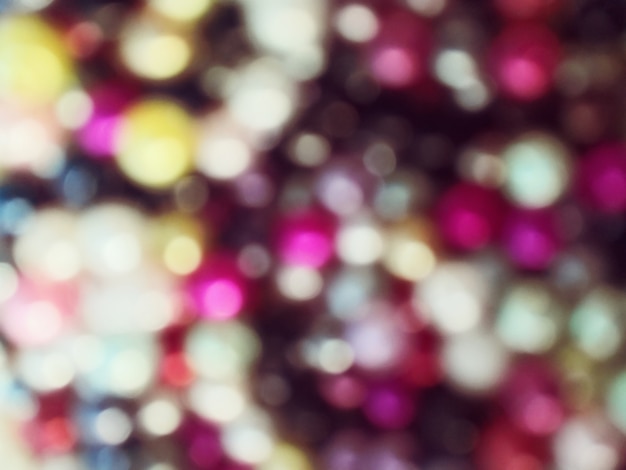 Photo bright and sparkling bokeh background. colorful -blurred lighting from glitter texture.