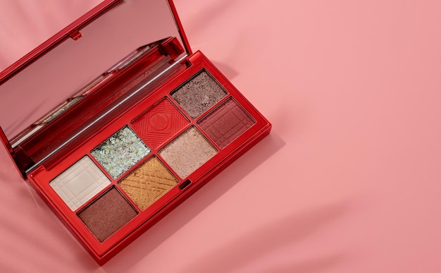 Bright summer eyeshadow palette with greens and reds