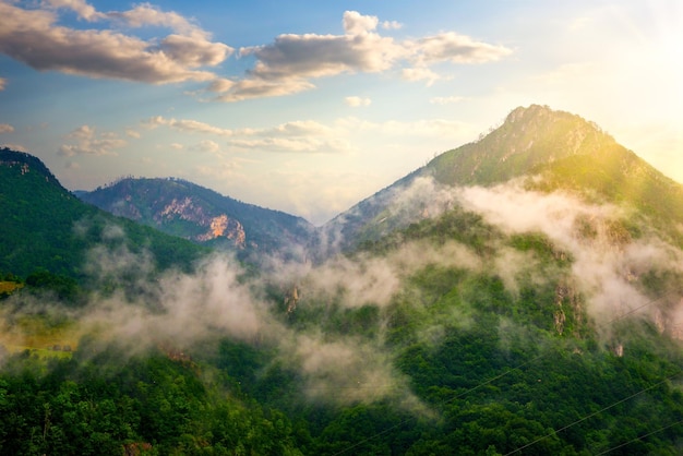 Bright sunrise in mountains