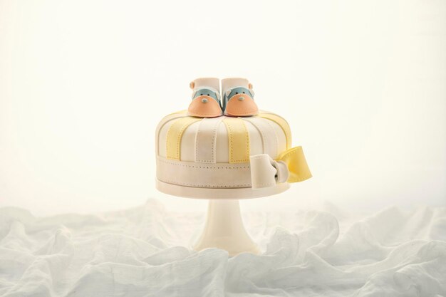 Photo bright tone on white background delicious beautiful lovely fondant cake
