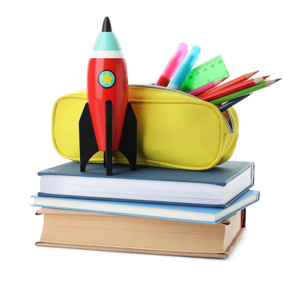 Bright toy rocket and school supplies on white background