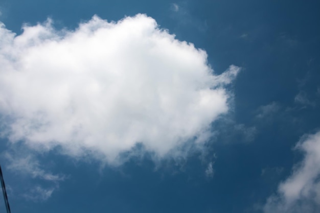 bright white clouds in the blue sky