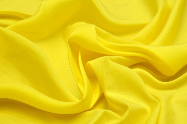 Bright yellow cotton fabric with added elastane for blouses.