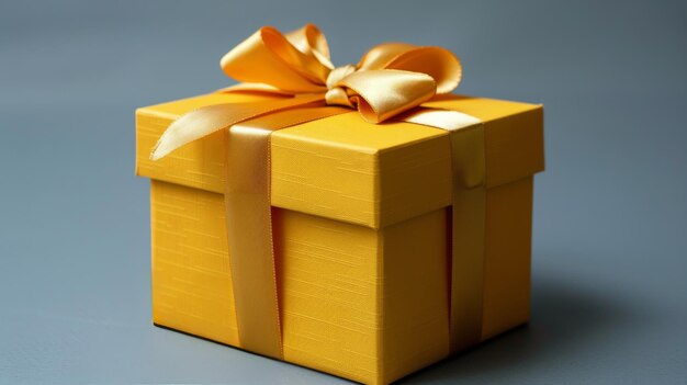 Photo bright yellow gift box with bow