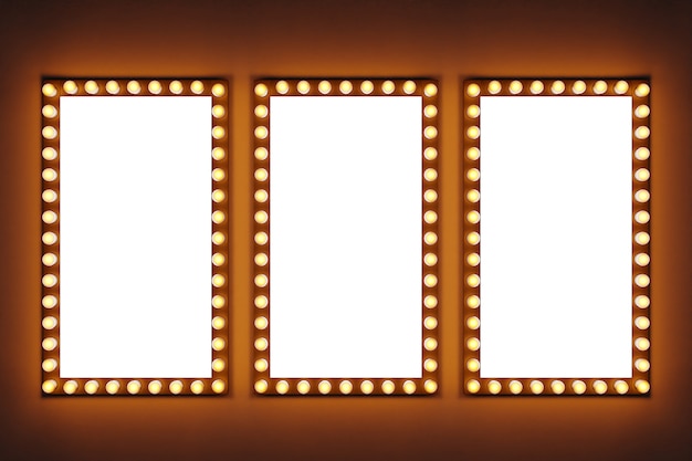 Bright yellow light bulbs in a row in the form of rectangles are lit on a brown isolated background. Three white rectangles around which light bulbs shine brightly