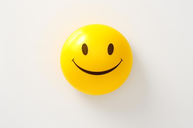 明るい黄色のスマイリーフェイスは幸福と積極性の普遍的な象徴です