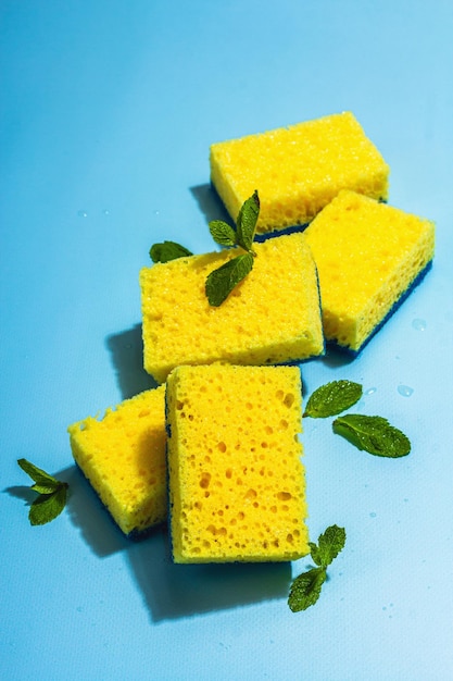 Bright yellow sponges for washing dishes Organic cleaning concept minty freshness