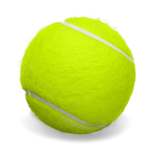 白い背景で隔離の明るい黄色のテニスボール。閉じる