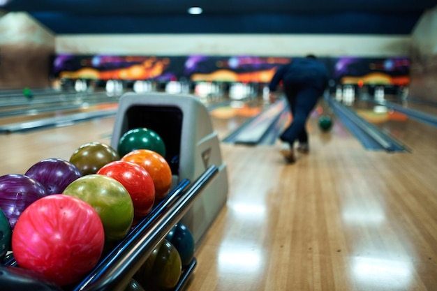 Brightly colored bowling balls close up