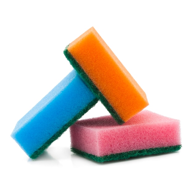 Brightly colored sponges on white background