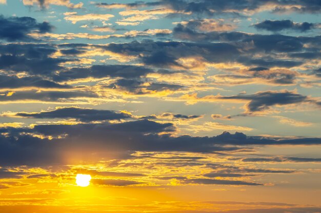 brightly colorful clouds in the evening sky Lush colored clouds in the sky before sunset