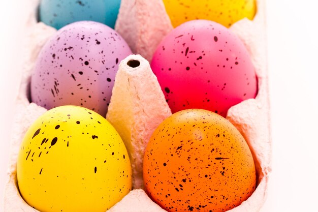 Brightly painted Easter eggs on a white background.