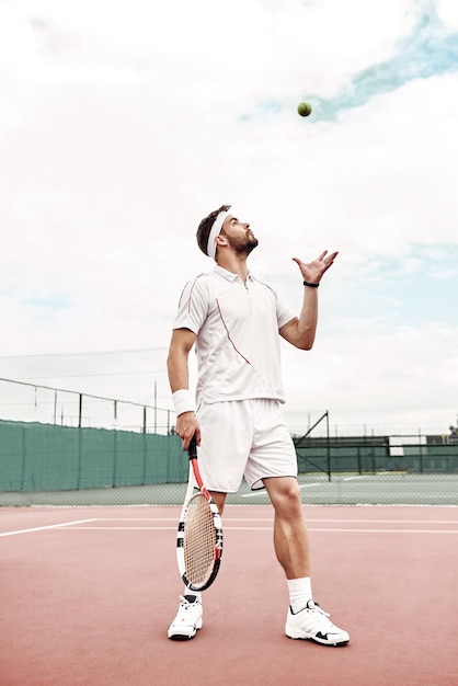 Brilliant performance handsome tennis player is ready to win the match