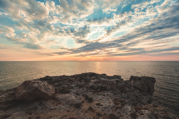 Brilliant vacation destination beach sunrise and sea cliffs background