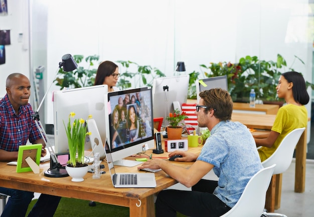 Bringing ideas into focus Shot of a young designers at work in an office