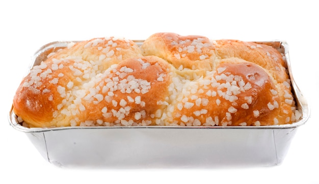 Brioche with sugar on white