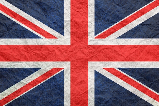 Britain flag on old crumpled craft paper Textured background wallpaper for design