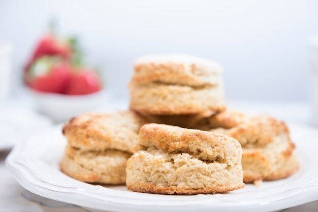 British scones in a white environment with strawberries