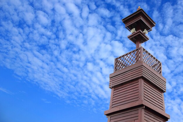 Broadcast tower isolated on blue sky background 