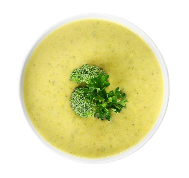 Broccoli cheddar soup in bowl isolated on white