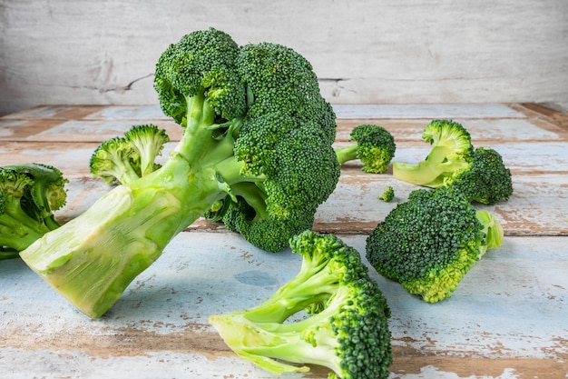 Broccoli fresh on wooden boards.