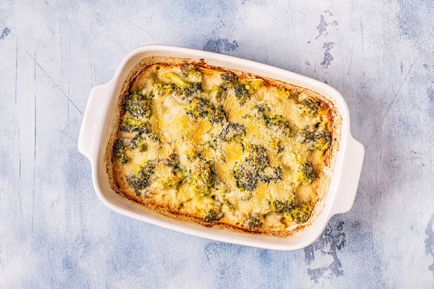 Broccoli gratin in a baking dish, top view.