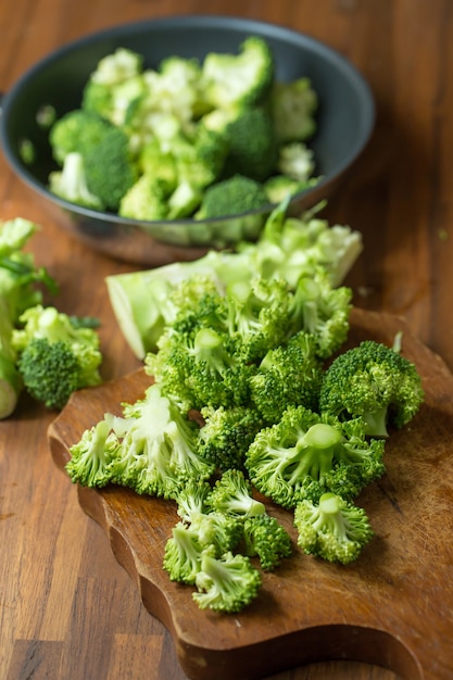 Broccoli.Raw fresh broccoli on wooden table