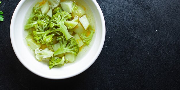 Broccoli soup cauliflower vegetables plate on the table first course meal snack copy space food