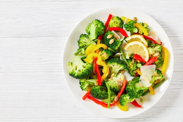 Broccoli sweet pepper green beans salad on a plate