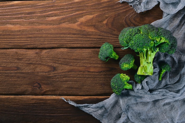 Broccoli On a wooden background Top view Free space for your text