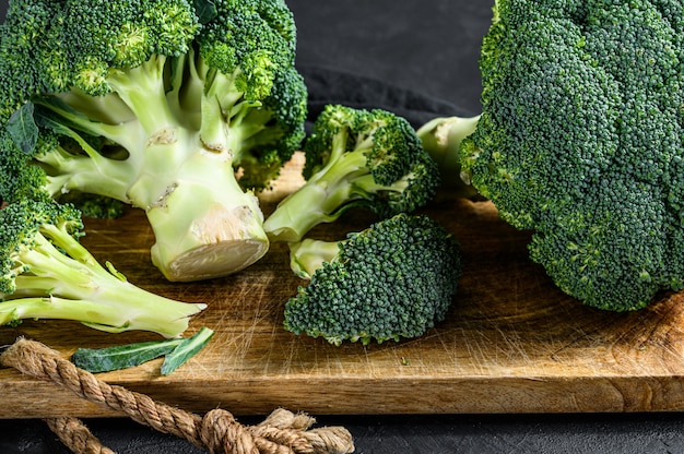 Broccoli in a wooden bowl. Top view