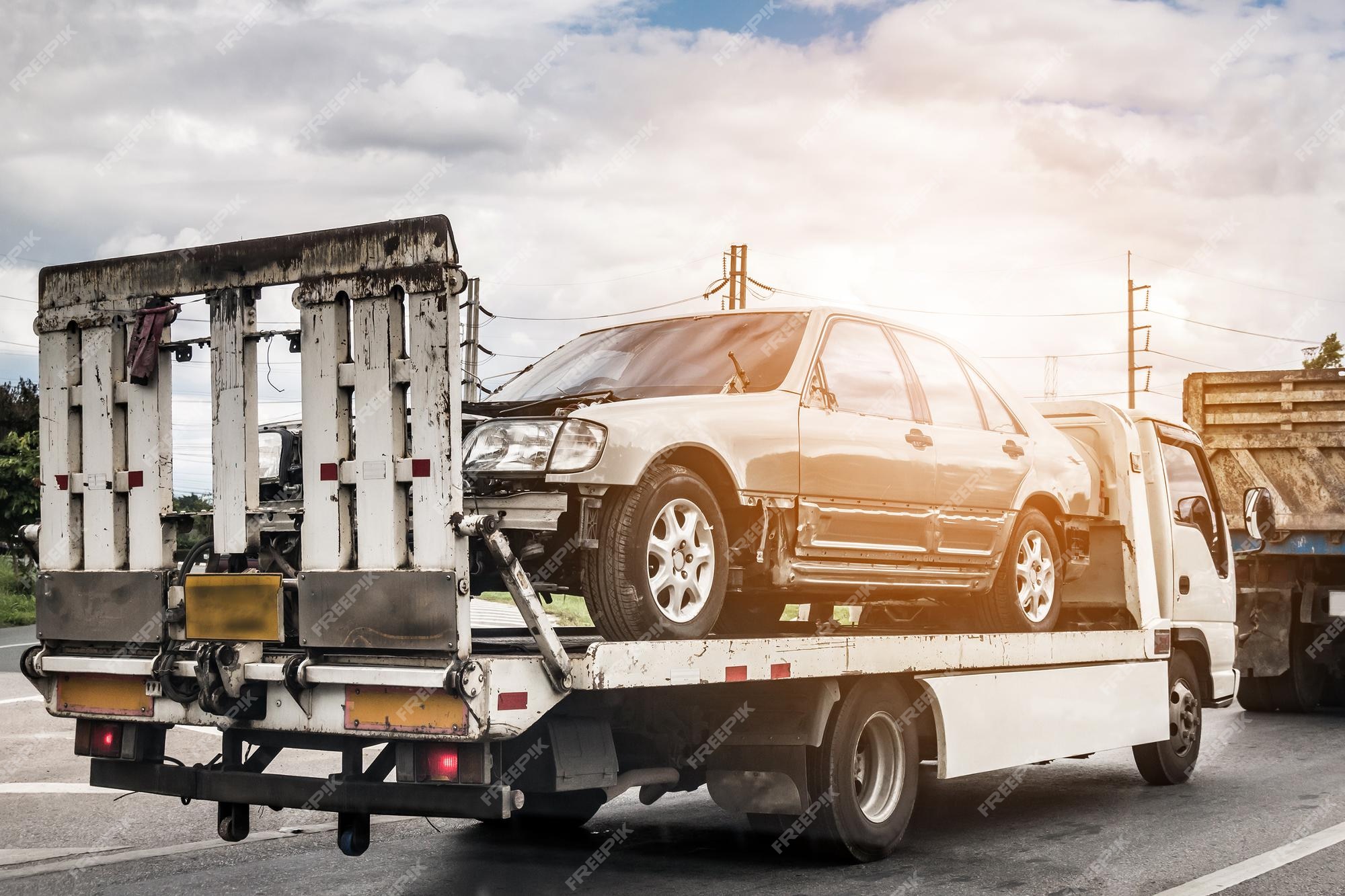 Car Accident tow truck towing the cars away Stock Photo - Alamy