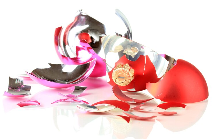फोटो broken christmas toys isolated on white