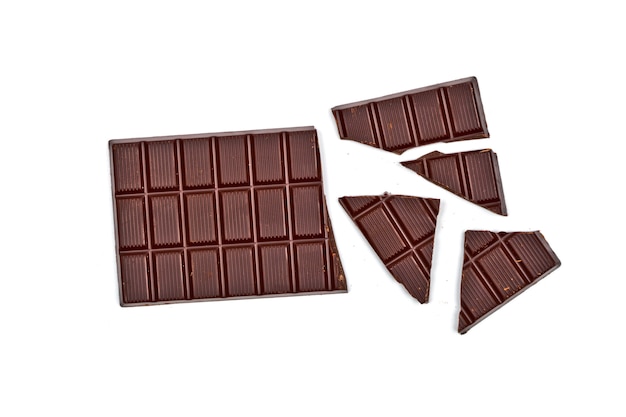 Broken dark chocolate bar isolated 