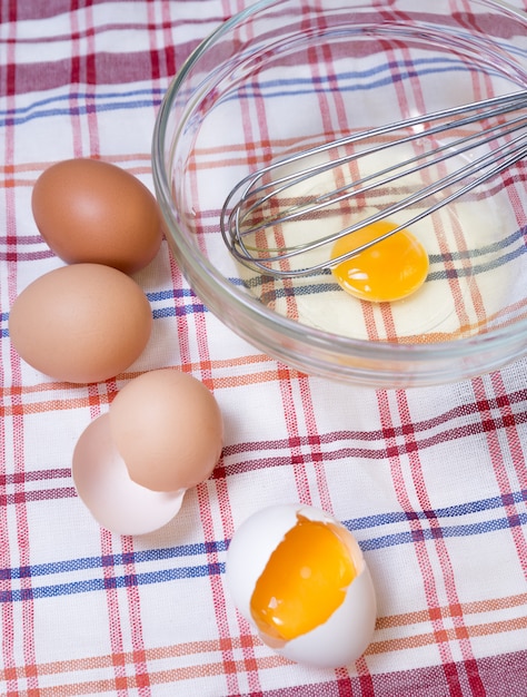 Broken egg in a bowl in the kitchen