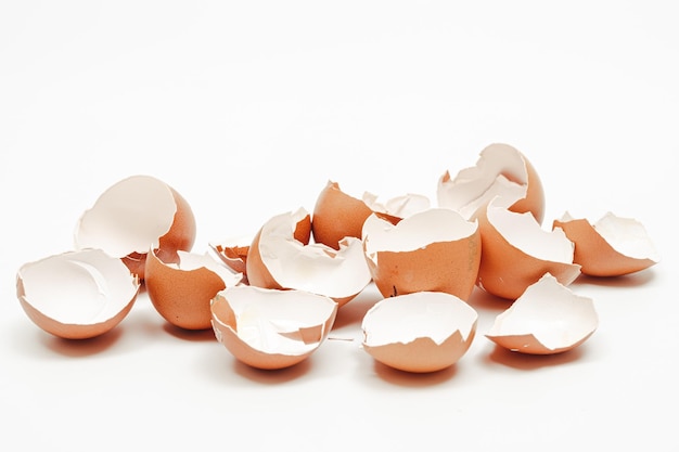 Broken eggshell collection on white background