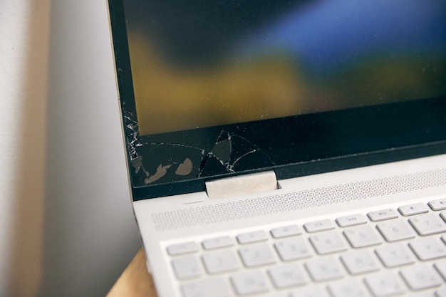 Broken glass on your favorite laptop Is it worth repairing or buying a new one