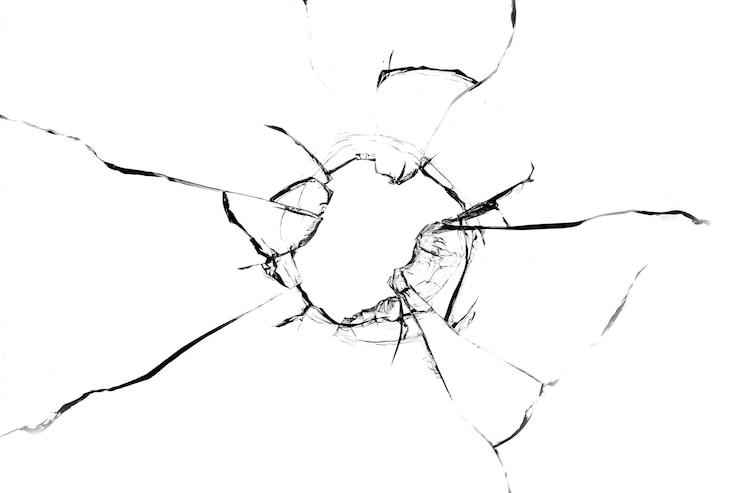 Photo broken hole in glass white background