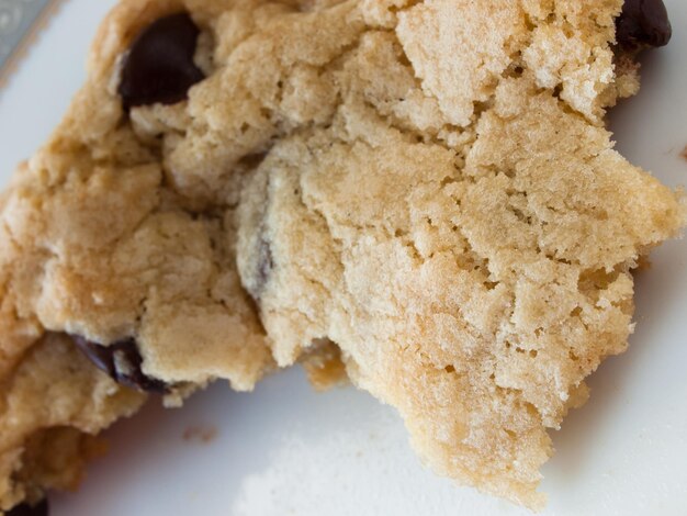 Broken homemade chocolate chip cookies.