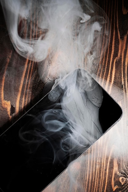 A broken mobile phone smoked