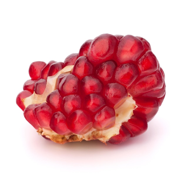 Broken pomegranate segment isolated on white background cutout