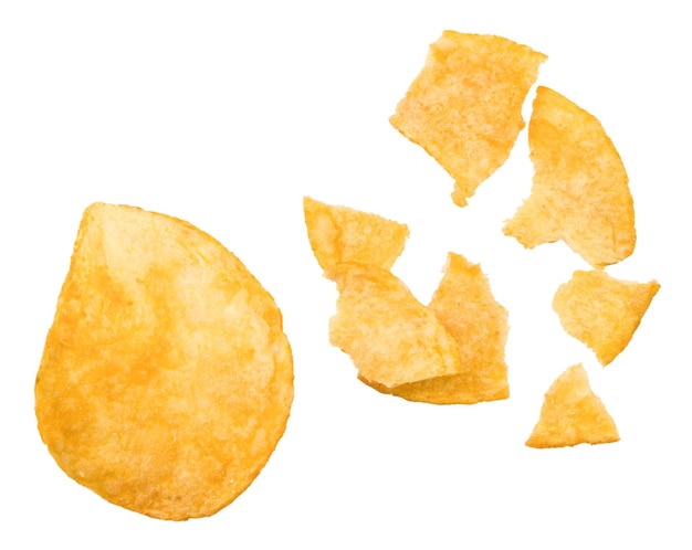 Broken potato chips isolated on white background, top view.