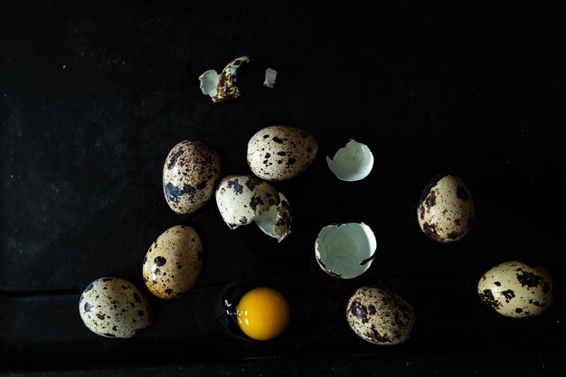 Photo broken quail egg with yolk fresh and natural farm produce