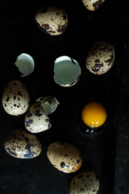 Photo broken quail egg with yolk fresh and natural farm produce