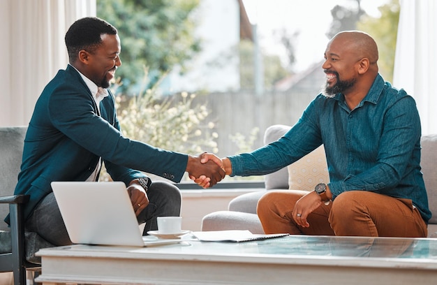Photo broker handshake and black man in a house with a client for meeting or consultation for agreement financial advisor shaking hands with happy person for investment savings budget or insurance deal