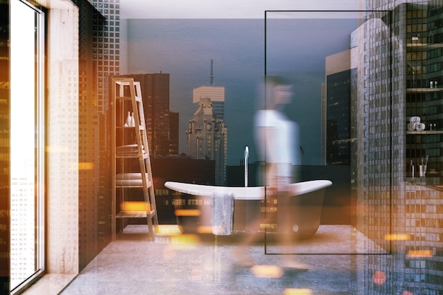 Bronze bathtub with a towel hanging on it standing on a concrete floor of a minimalistic gray wall bathroom. A woman. 3d rendering mock up toned image double exposure blurred