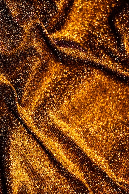 Bronze holiday sparkling glitter abstract background luxury shiny fabric material for glamour design and festive invitation