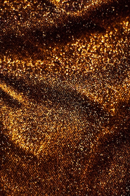 Bronze holiday sparkling glitter abstract background luxury shiny fabric material for glamour design and festive invitation